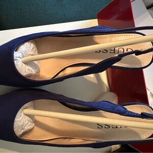Guess peep toe navy blue suede shoes. Size 6.5 with 5 in heel. Worn only once.